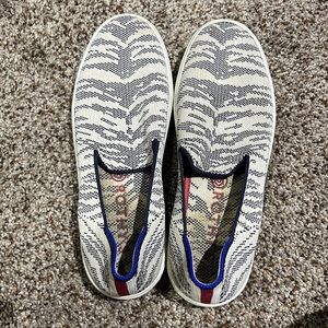 Rothy’s Sand red and blue slip on sneaker